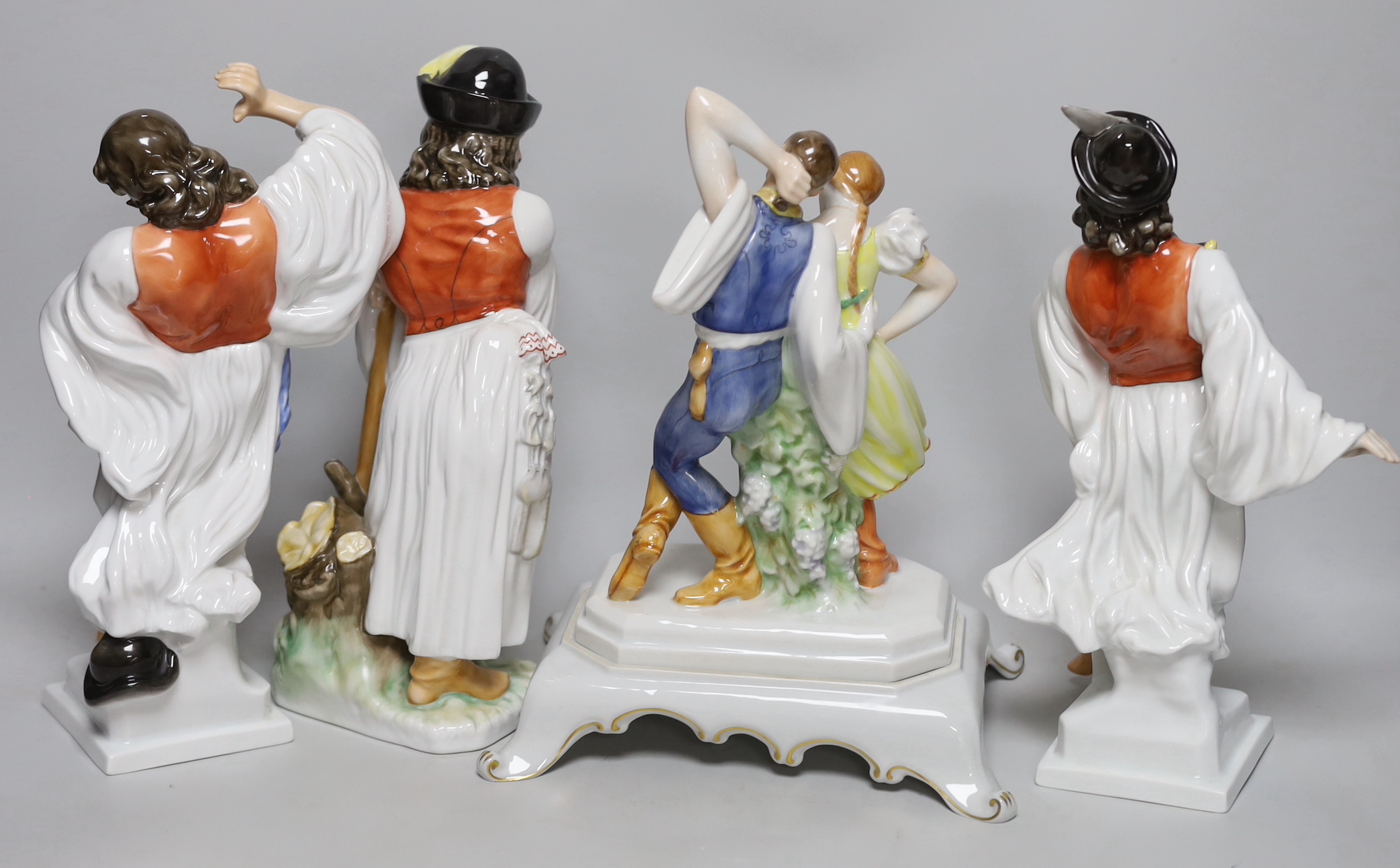 Four vintage Herend figures including pair of dancing figures and a shepherd, each with stamp to the base, the largest 29cm high